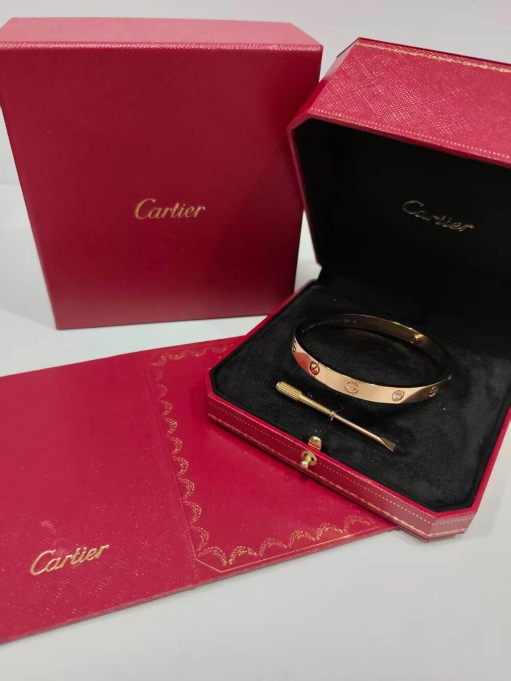 Cartier Red and Black Bracelet with Gold Accents